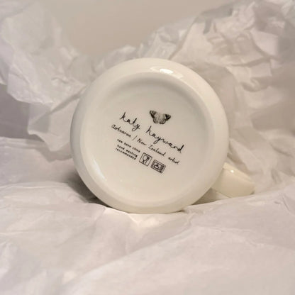 Katy Hayward | Ceramic Mug | Come Fly With Me – Pīwakawaka/ Fantail