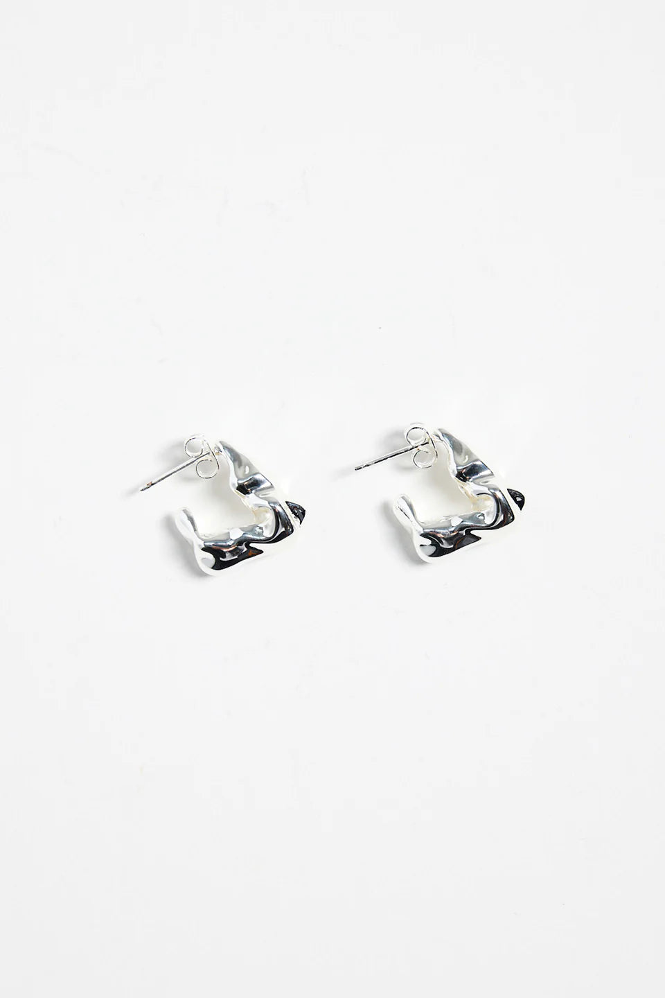 Stories to be Told - Wavy SS Plated Huggie Earrings