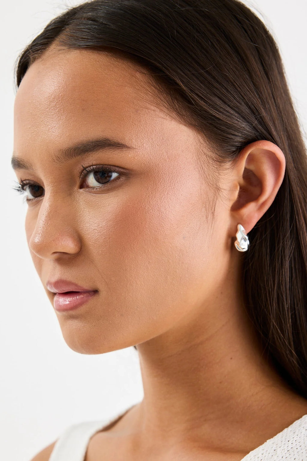 Stories to be Told - Wavy SS Plated Huggie Earrings